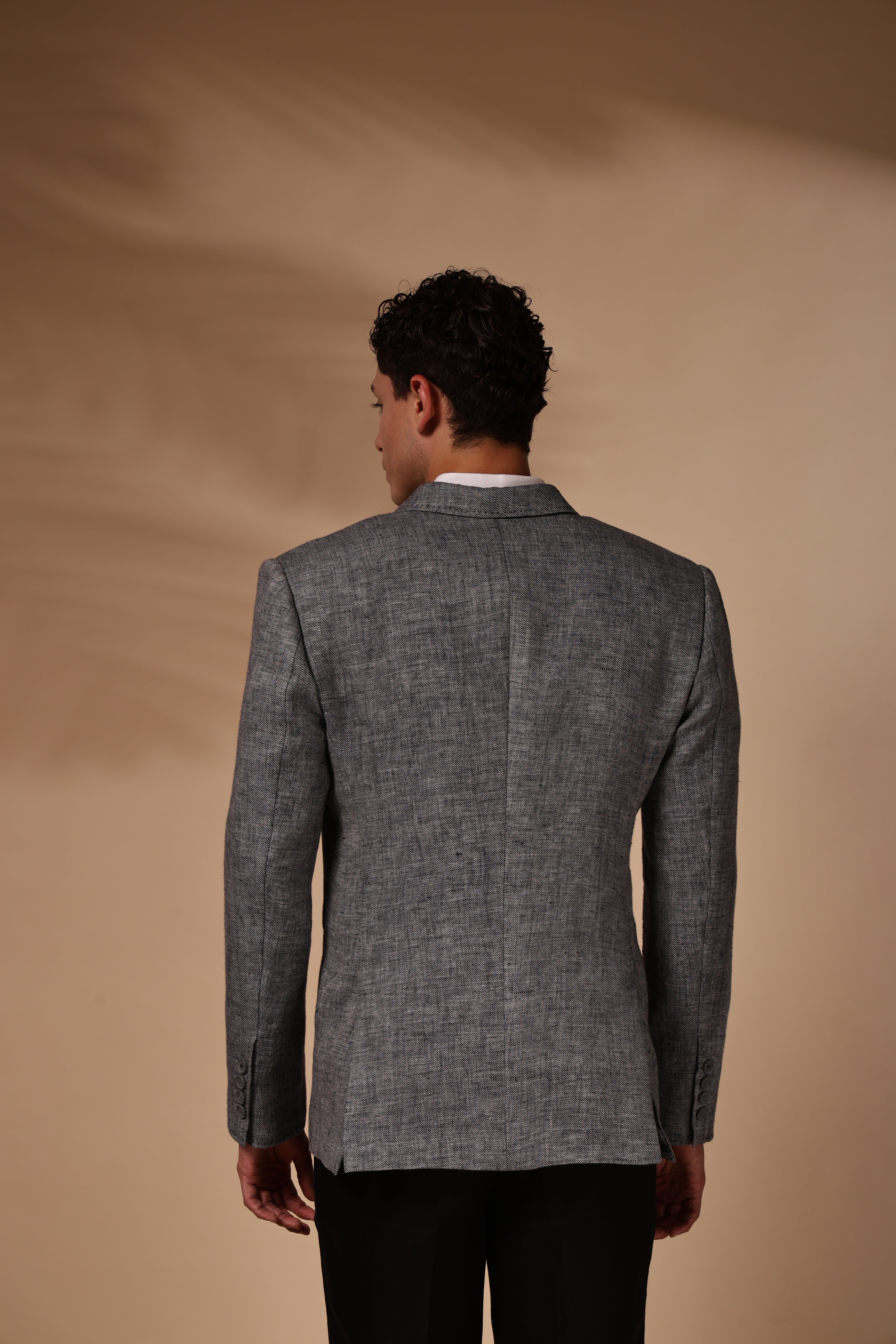 The grey linen double-breasted blazer