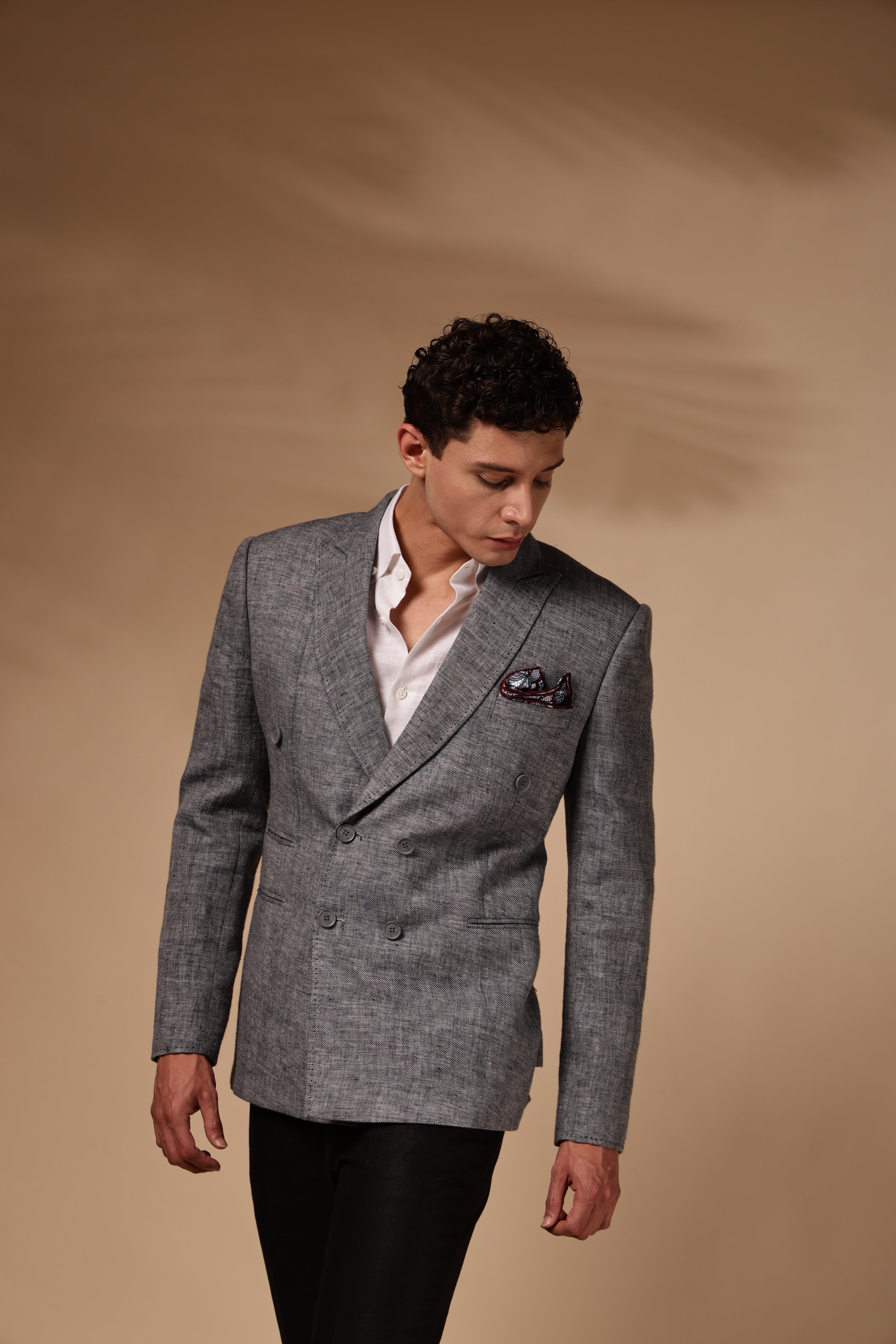 The grey linen double-breasted blazer